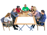 Photo of people sat around a table having a meeting